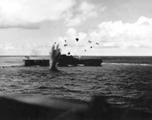 Japanese bomb explodes near USS Enterprise (CV-6) during the Battle of the Santa Cruz Islands on 26 October 1942.jpg