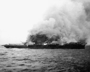 USS Lexington (CV-2) burning and sinking on 8 May 1942 (NH 51382).jpg